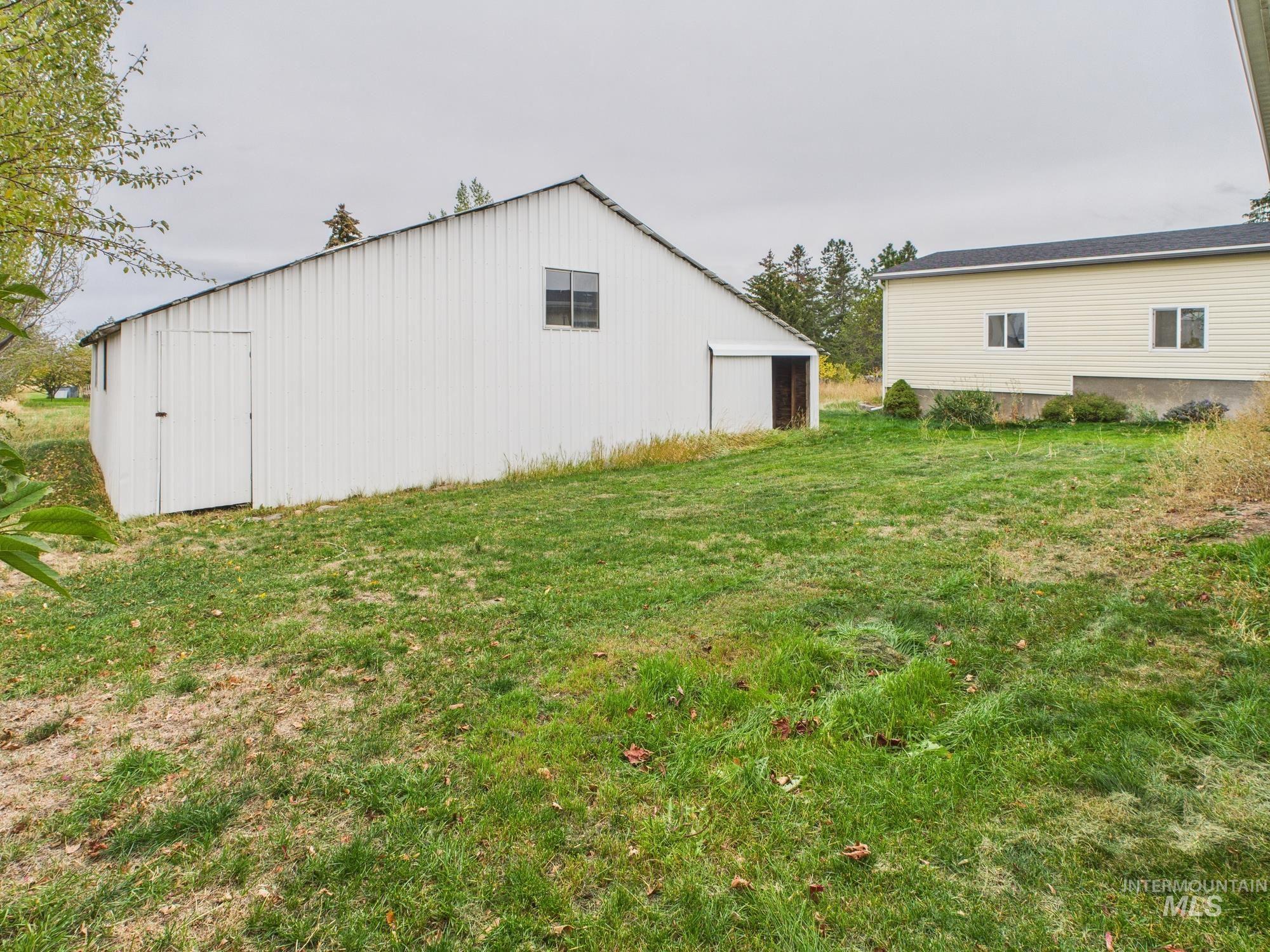 523 3rd Street Ferdinand, ID 83526 - Photo 31 of 41 View of pole building with a lawn