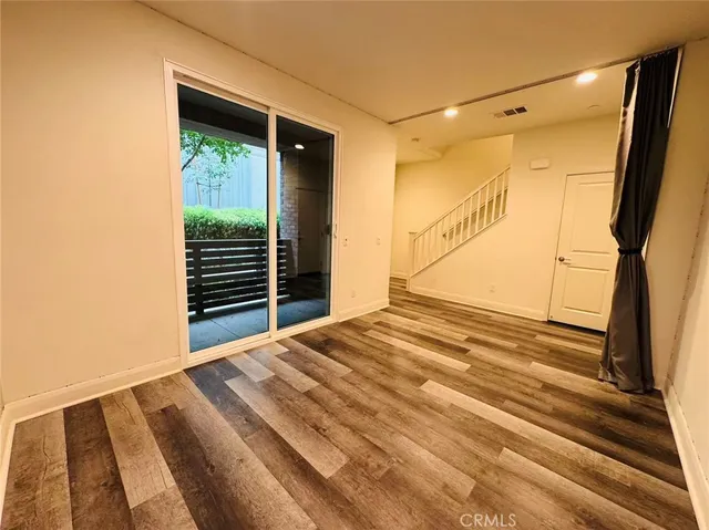 a view of a room with a staircase