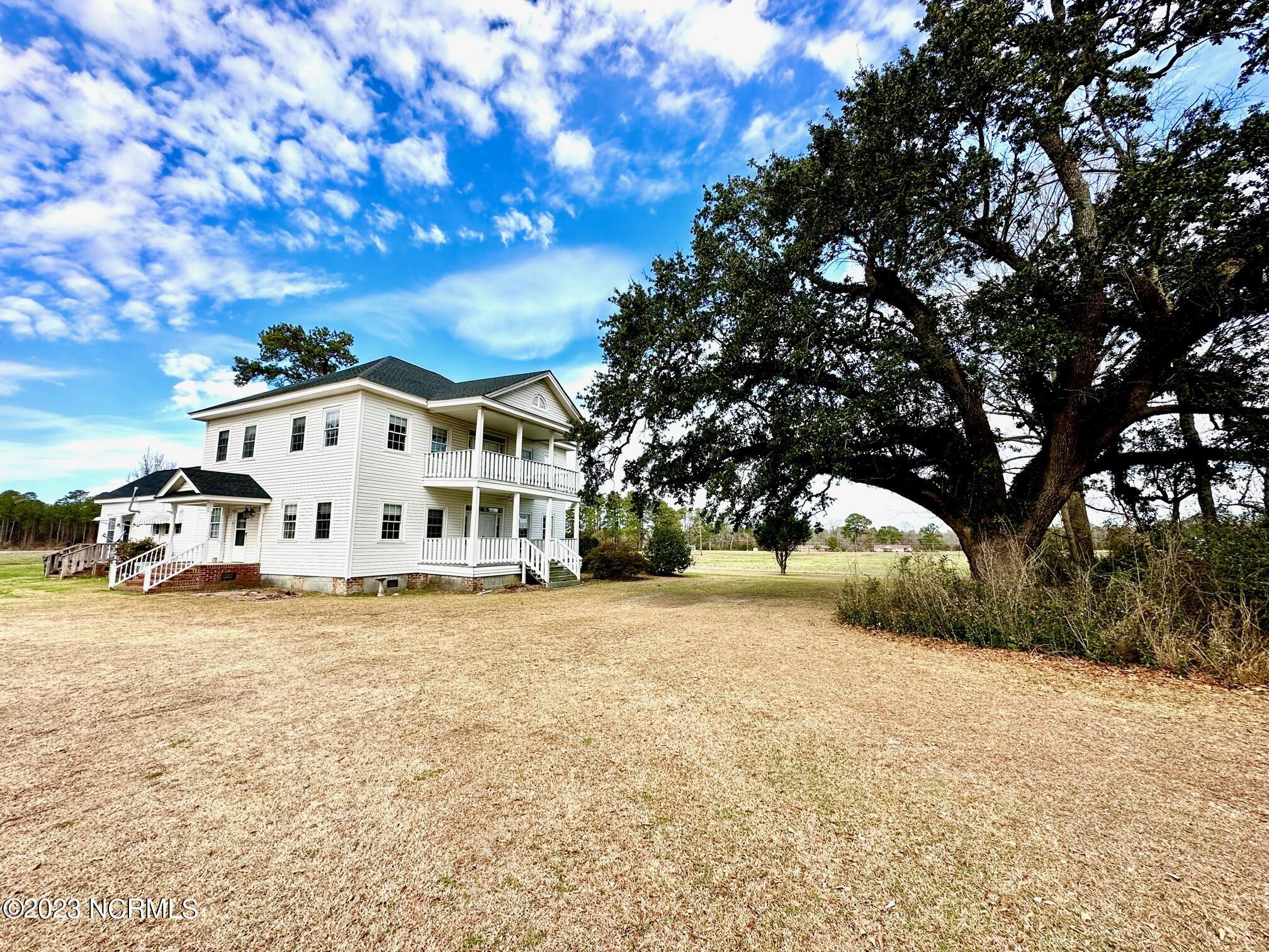 208 Dolph Lewis Road Chadbourn, NC 28431 - Photo 41 of 50 Side Home View