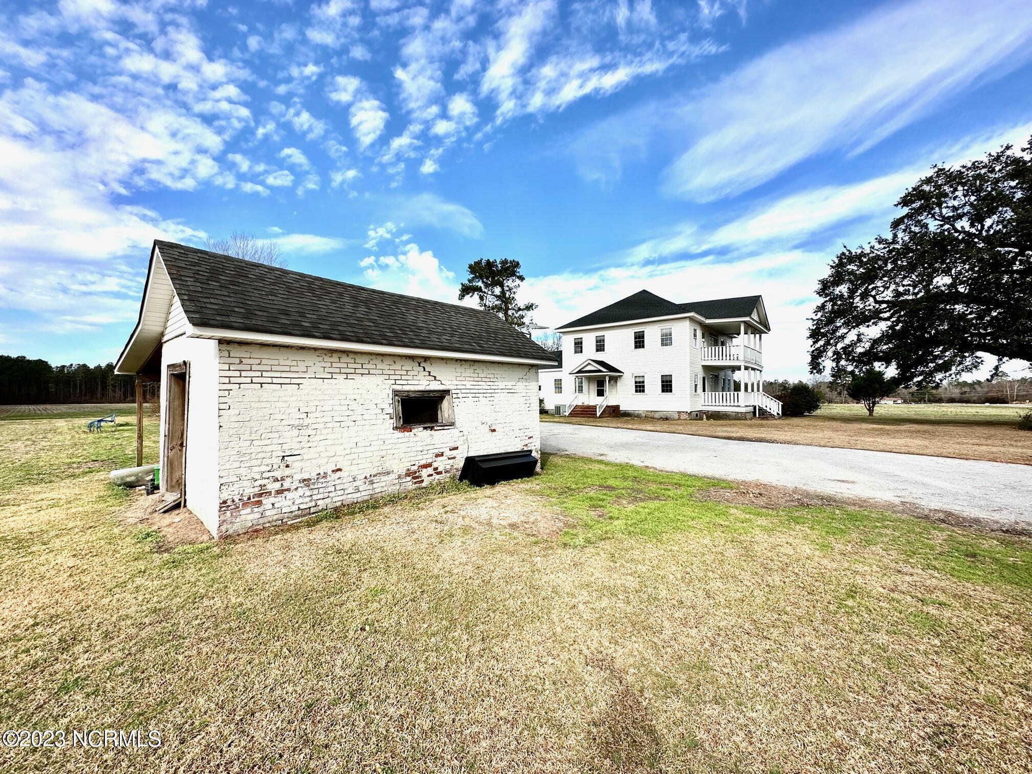208 Dolph Lewis Road Chadbourn, NC 28431 - Photo 42 of 50 With Brick Storage Building