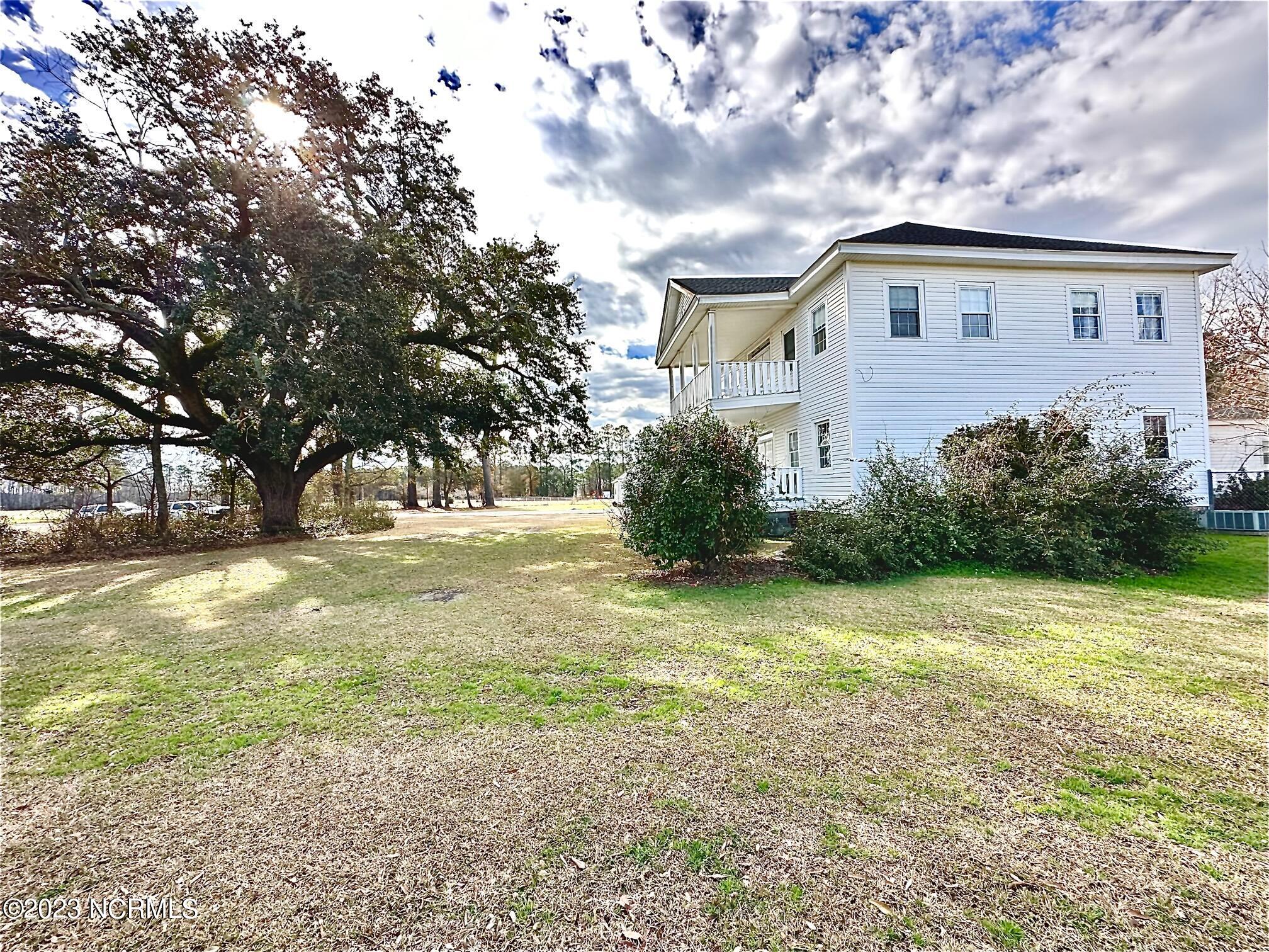 208 Dolph Lewis Road Chadbourn, NC 28431 - Photo 46 of 50 Side Home View