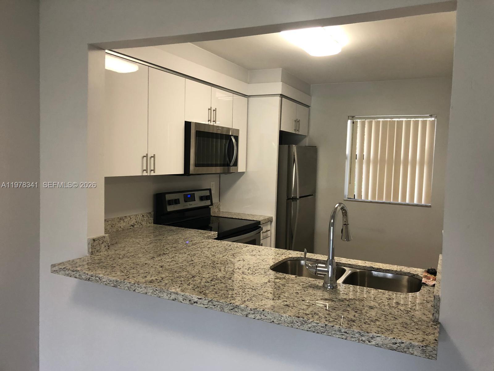 3400 Foxcroft Road, Unit 104 Miramar, FL 33025 - Photo 2 of 23