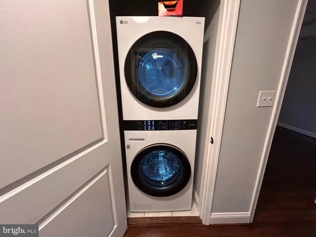 a view of livingroom with washer and dryer