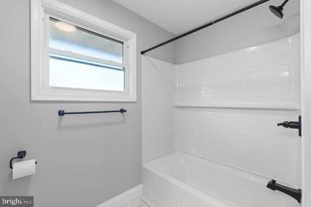 a bathroom with a bathtub