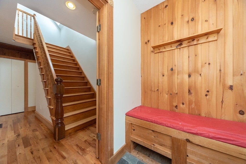 28 Branch Street Clinton, MA 01510 - Photo 15 of 30 a view of bedroom with stairs and wooden floor