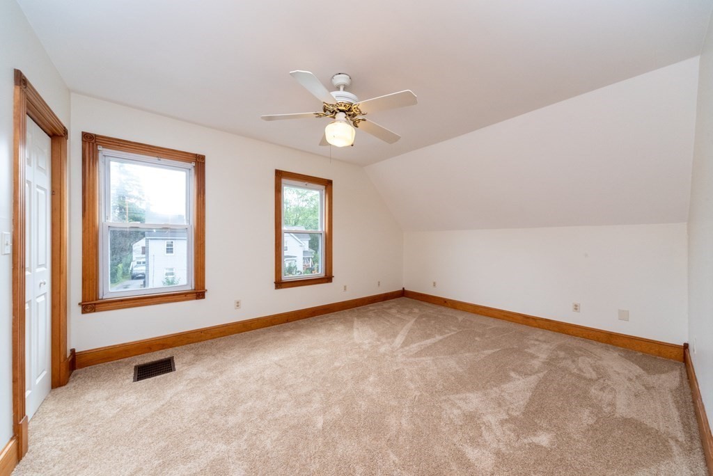 28 Branch Street Clinton, MA 01510 - Photo 17 of 30 a view of an empty room with a window