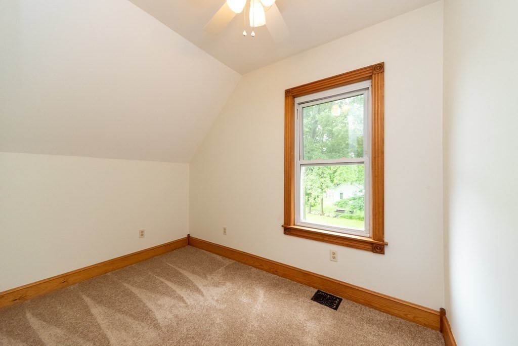 28 Branch Street Clinton, MA 01510 - Photo 20 of 30 an empty room with a window