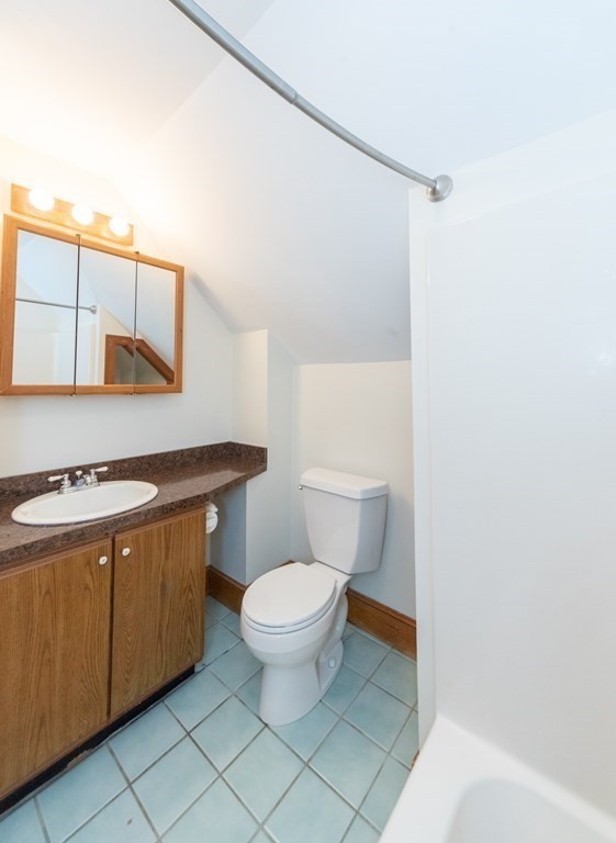 28 Branch Street Clinton, MA 01510 - Photo 21 of 30 a bathroom with a sink a toilet and mirror