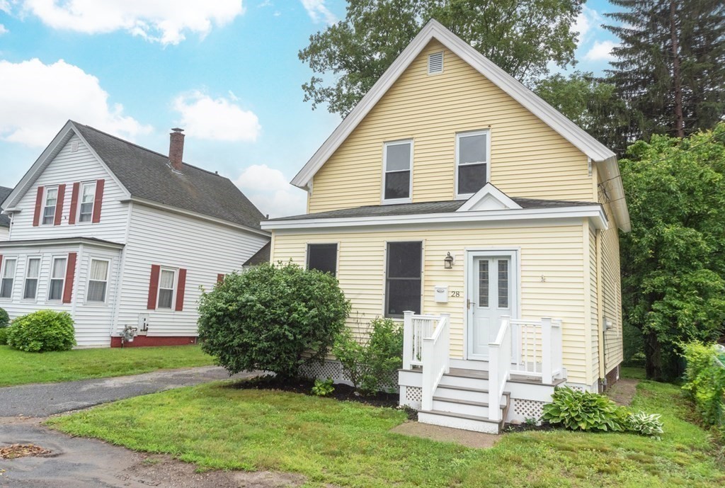 28 Branch Street Clinton, MA 01510 - Photo 29 of 30 a view of a house with a yard