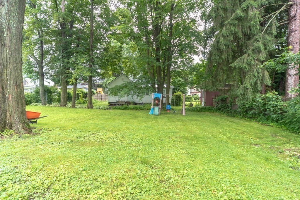 28 Branch Street Clinton, MA 01510 - Photo 3 of 30 a view of a park with large trees