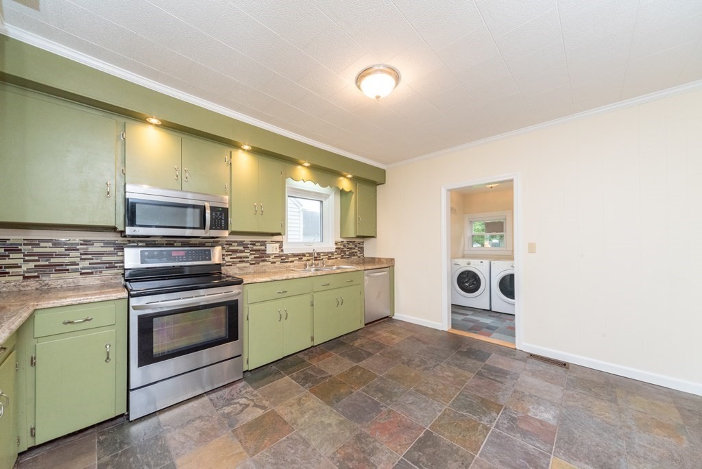 28 Branch Street Clinton, MA 01510 - Photo 6 of 30 a kitchen with a stove cabinets and a sink