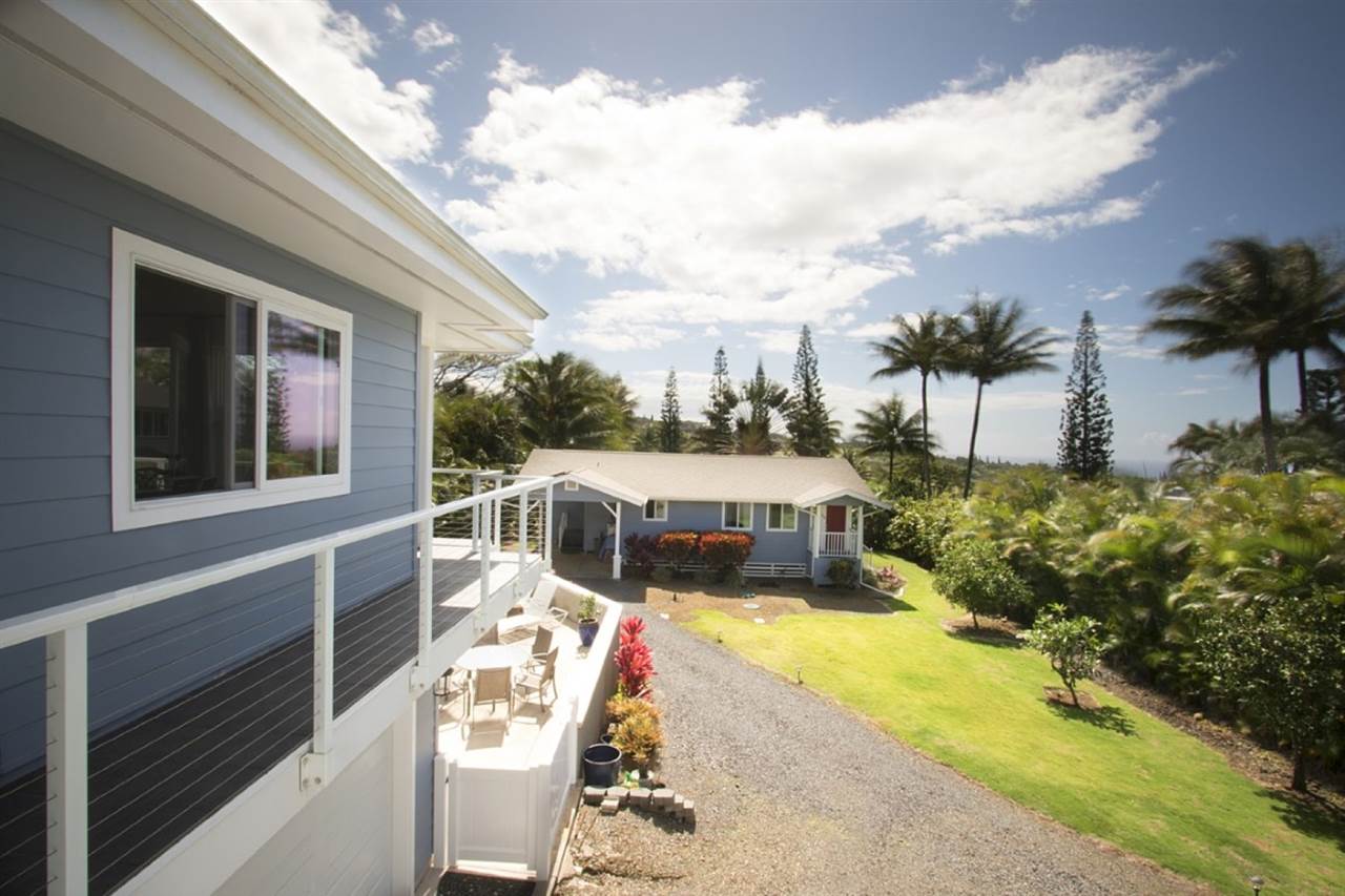 81 North Holokai Road Haiku, HI 96708 - Photo 12 of 30 a view of a house with swimming pool and sitting area