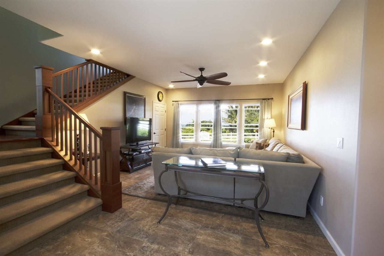 81 North Holokai Road Haiku, HI 96708 - Photo 14 of 30 a living room with furniture and a large window