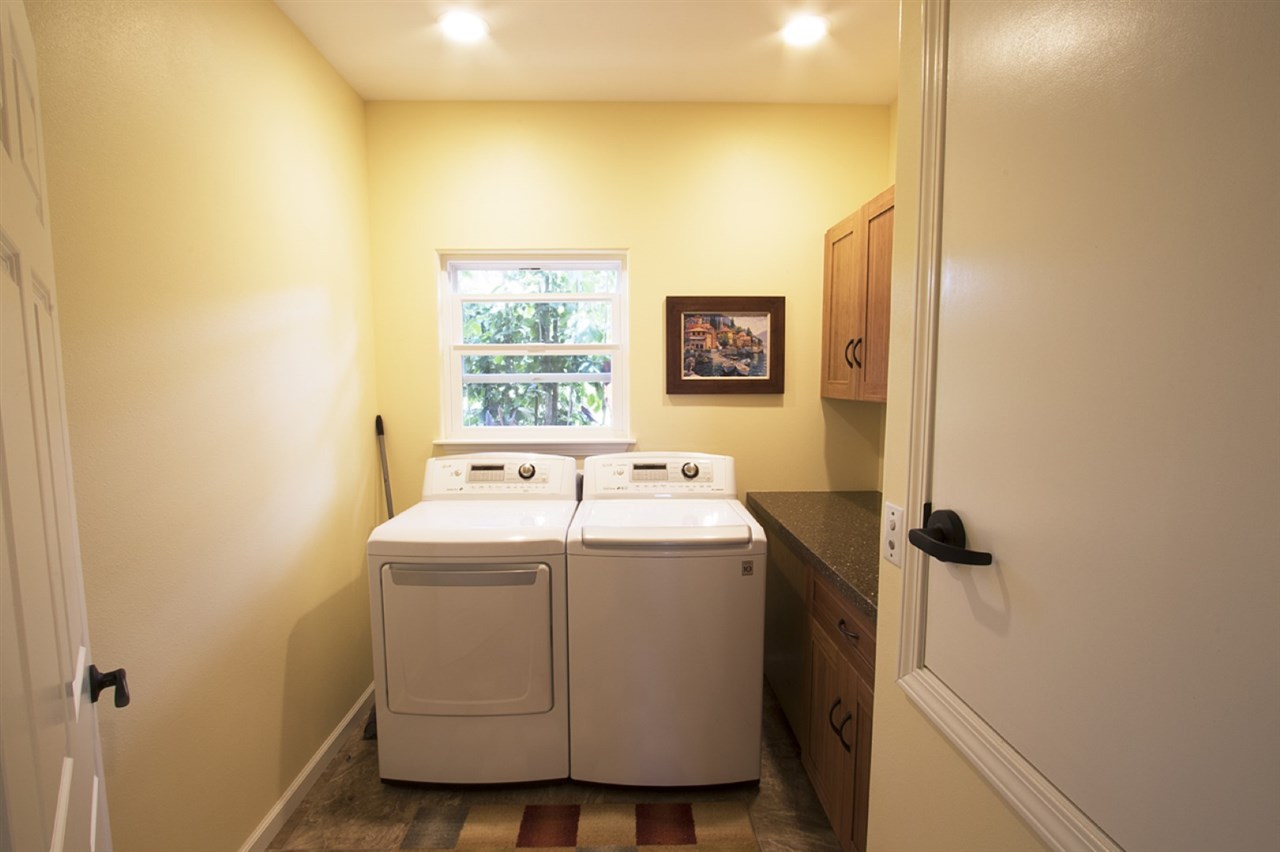 81 North Holokai Road Haiku, HI 96708 - Photo 17 of 30 a utility room with dryer and washer