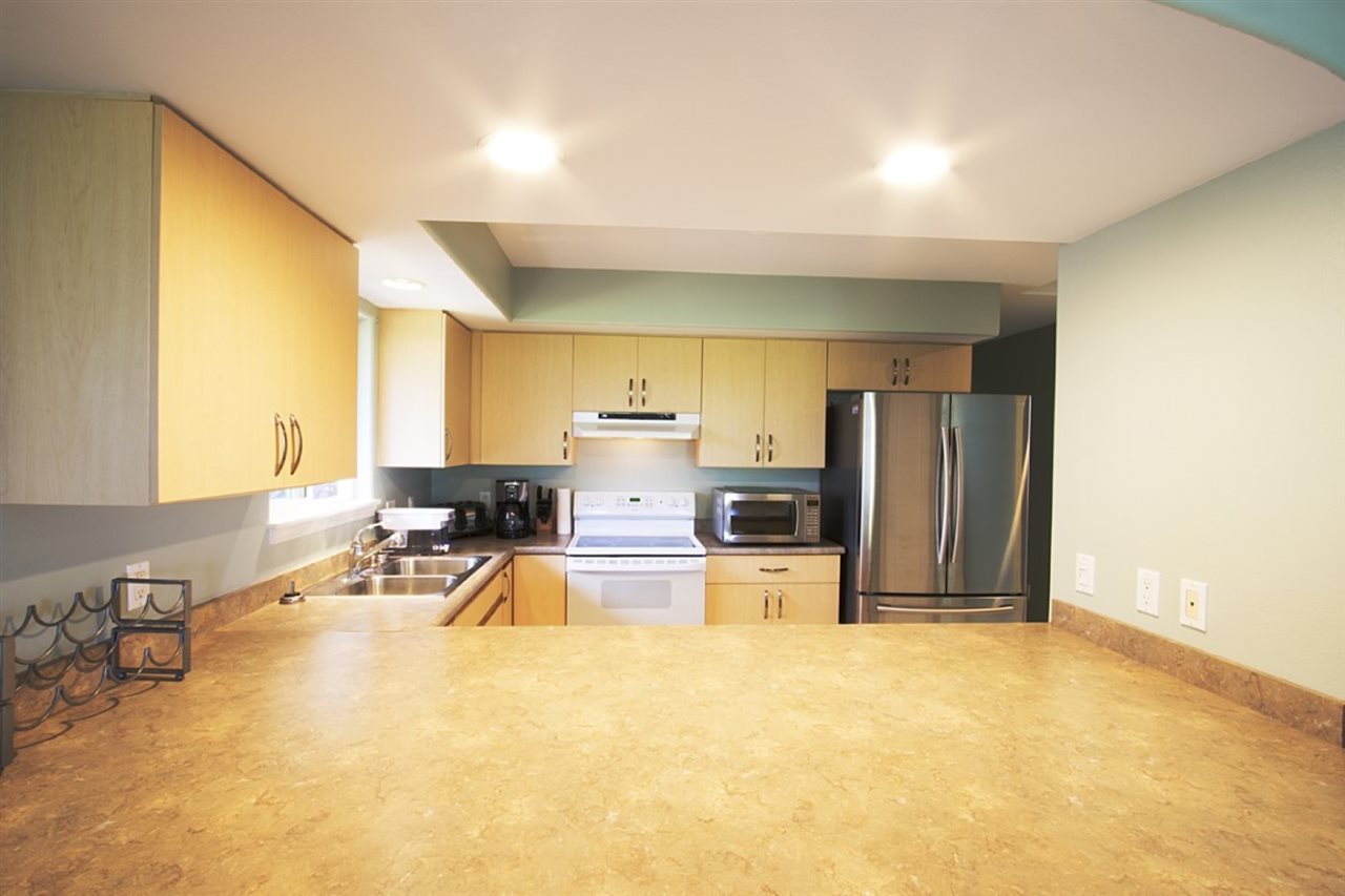 81 North Holokai Road Haiku, HI 96708 - Photo 28 of 30 a view of a kitchen with furniture and a window