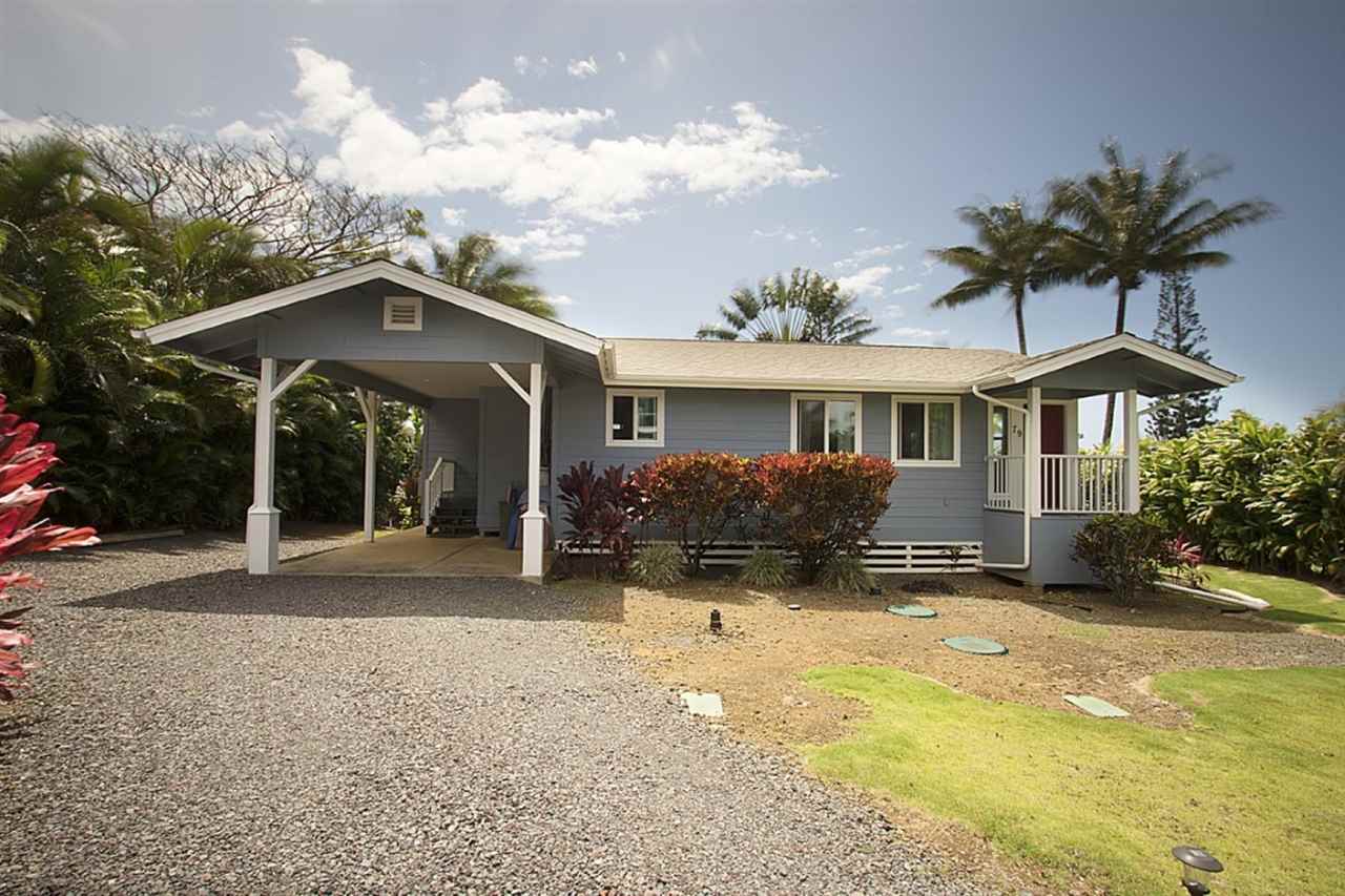 81 North Holokai Road Haiku, HI 96708 - Photo 30 of 30 a front view of a house with a yard and garage