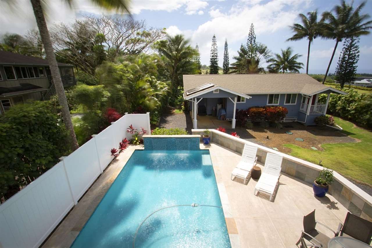81 North Holokai Road Haiku, HI 96708 - Photo 3 of 30 a view of house with swimming pool outdoor seating