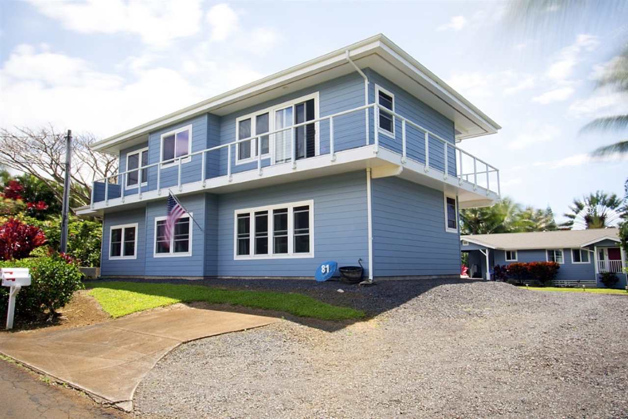 81 North Holokai Road Haiku, HI 96708 - Photo 4 of 30 a front view of a house with a yard and potted plants
