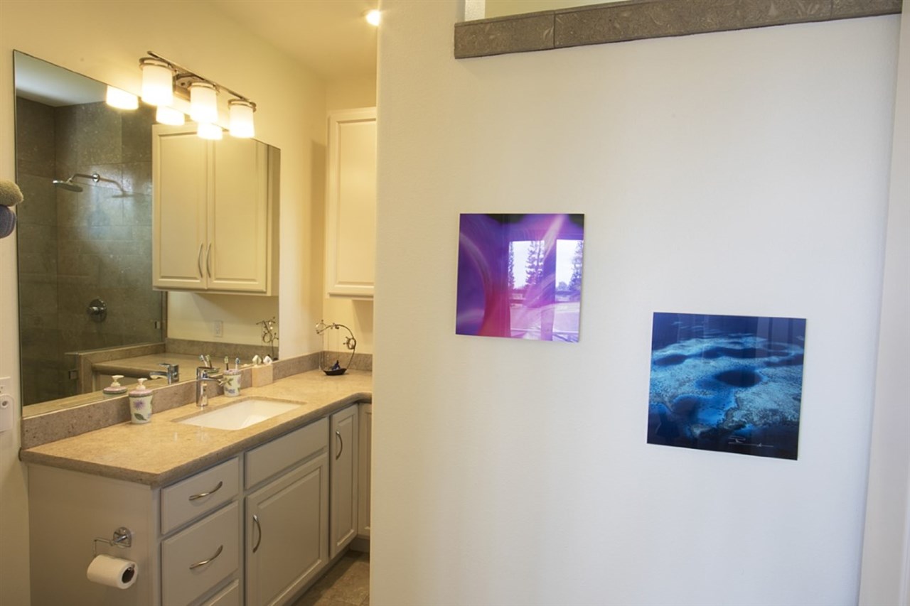 81 North Holokai Road Haiku, HI 96708 - Photo 6 of 30 a bathroom with a sink vanity and a mirror