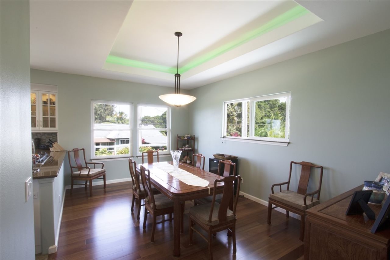 81 North Holokai Road Haiku, HI 96708 - Photo 8 of 30 a view of a dining room with furniture window and wooden floor