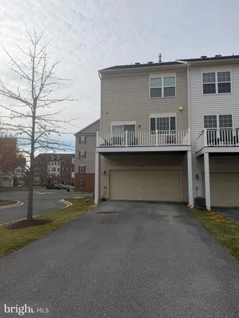 a view of a house with a street
