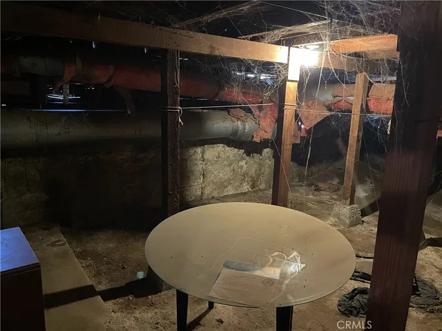 a kitchen with a sink cabinets and window