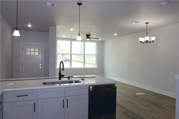 a bathroom with a sink and a window