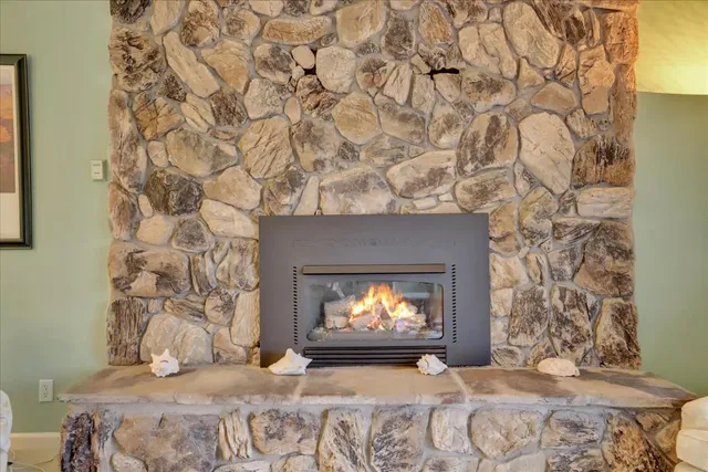 a stove top oven sitting inside of a kitchen