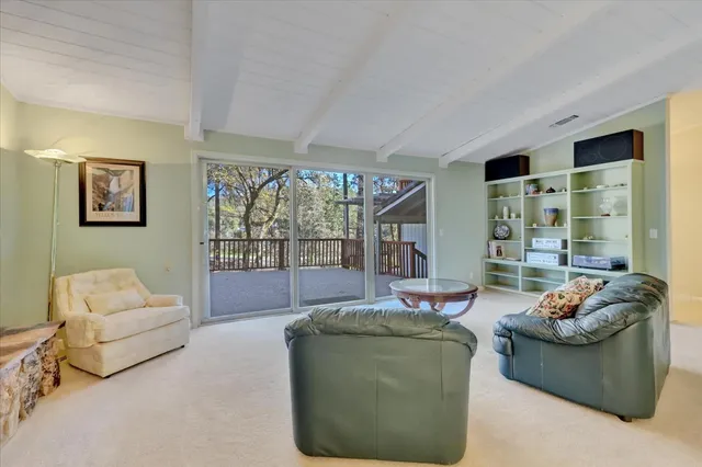 a kitchen with stainless steel appliances granite countertop a stove a refrigerator and a cabinets