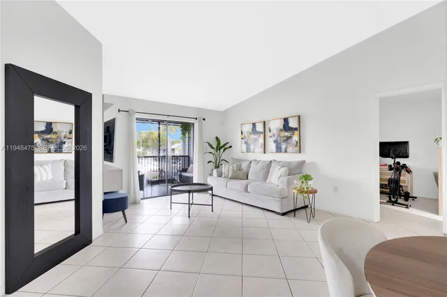 a living room with furniture and a couch