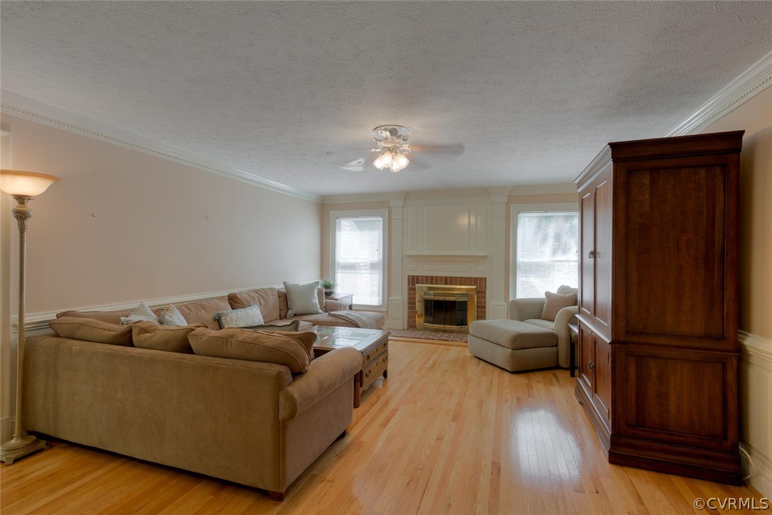 9211 Cattail Road Chesterfield, VA 23838 - Photo 11 of 37 a living room with furniture and a fireplace