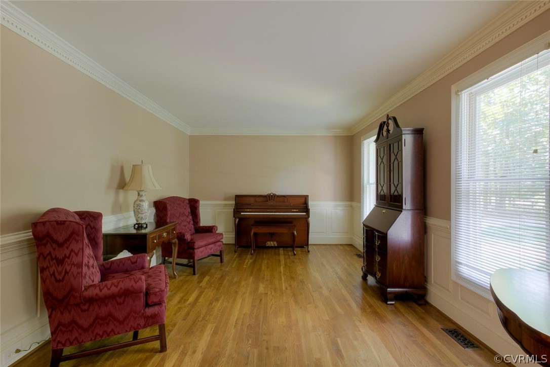 9211 Cattail Road Chesterfield, VA 23838 - Photo 13 of 37 a living room with furniture and a flat screen tv