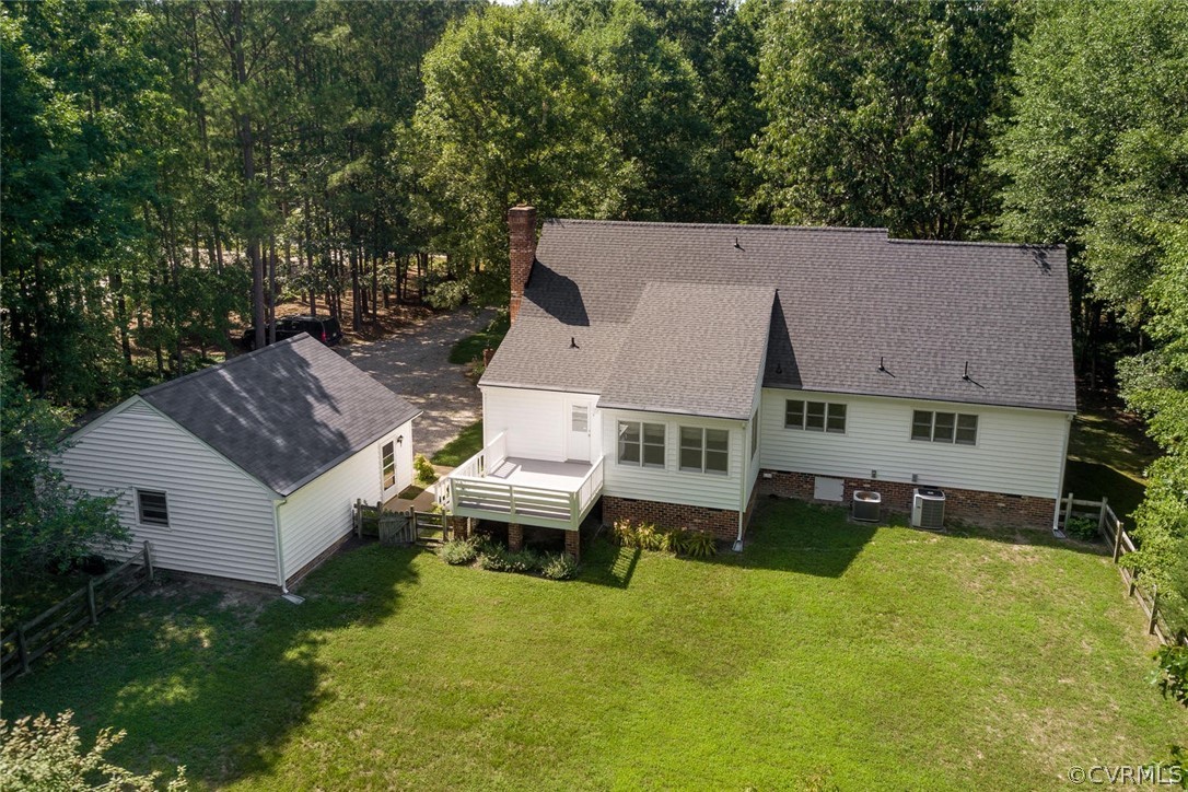 9211 Cattail Road Chesterfield, VA 23838 - Photo 2 of 37 an aerial view of a house with swimming pool next to a big yard