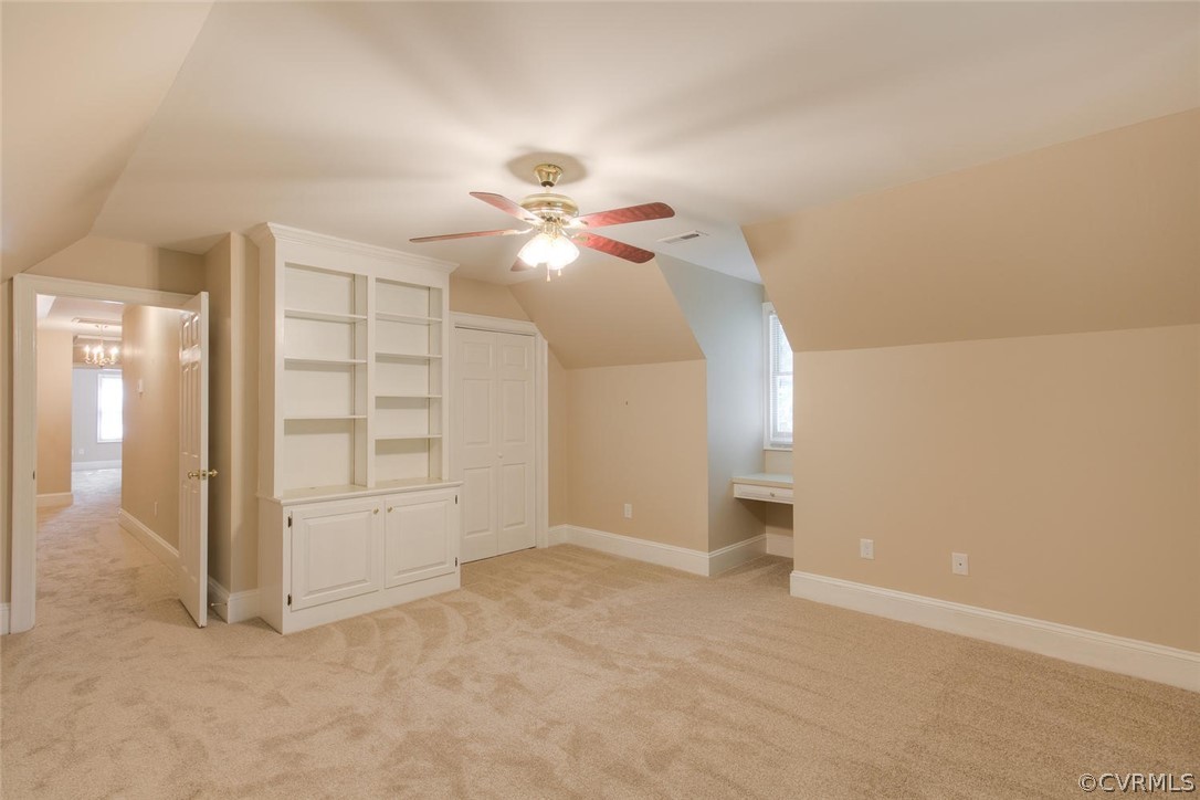 9211 Cattail Road Chesterfield, VA 23838 - Photo 24 of 37 an empty room with chandelier fan and windows