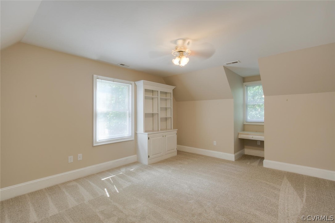 9211 Cattail Road Chesterfield, VA 23838 - Photo 28 of 37 an empty room with chandelier fan and windows
