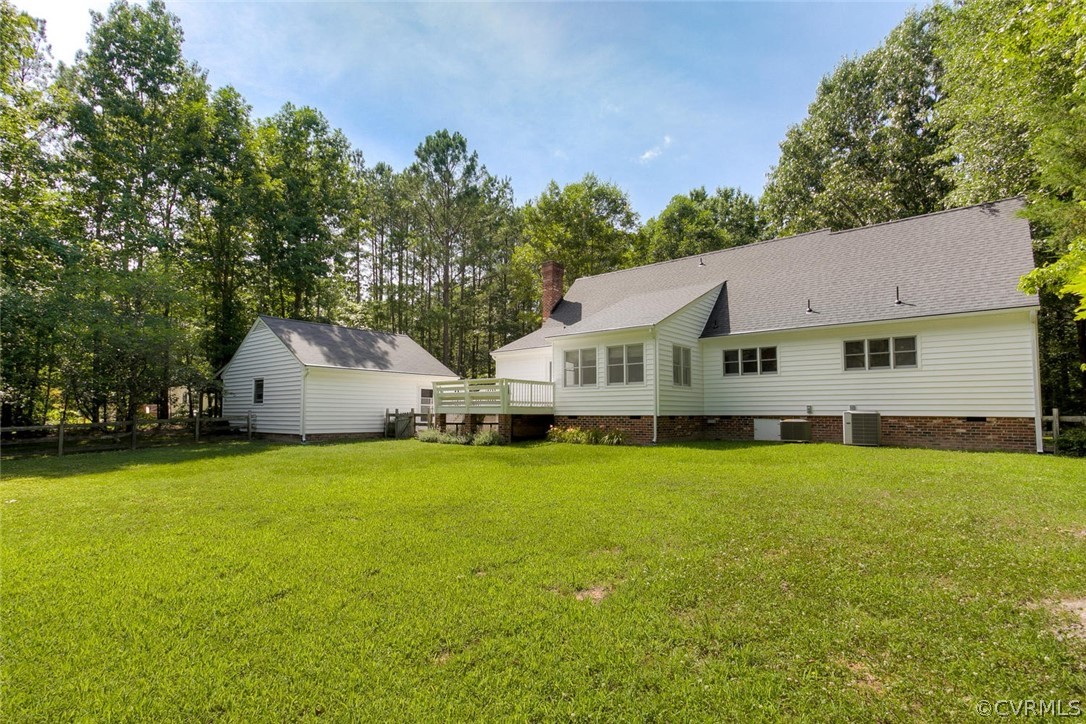 9211 Cattail Road Chesterfield, VA 23838 - Photo 29 of 37 a front view of a house with a big yard and large trees