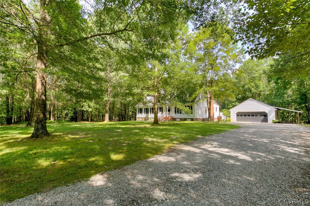 9211 Cattail Road Chesterfield, VA 23838 - Photo 3 of 37 a view of a big yard with large trees