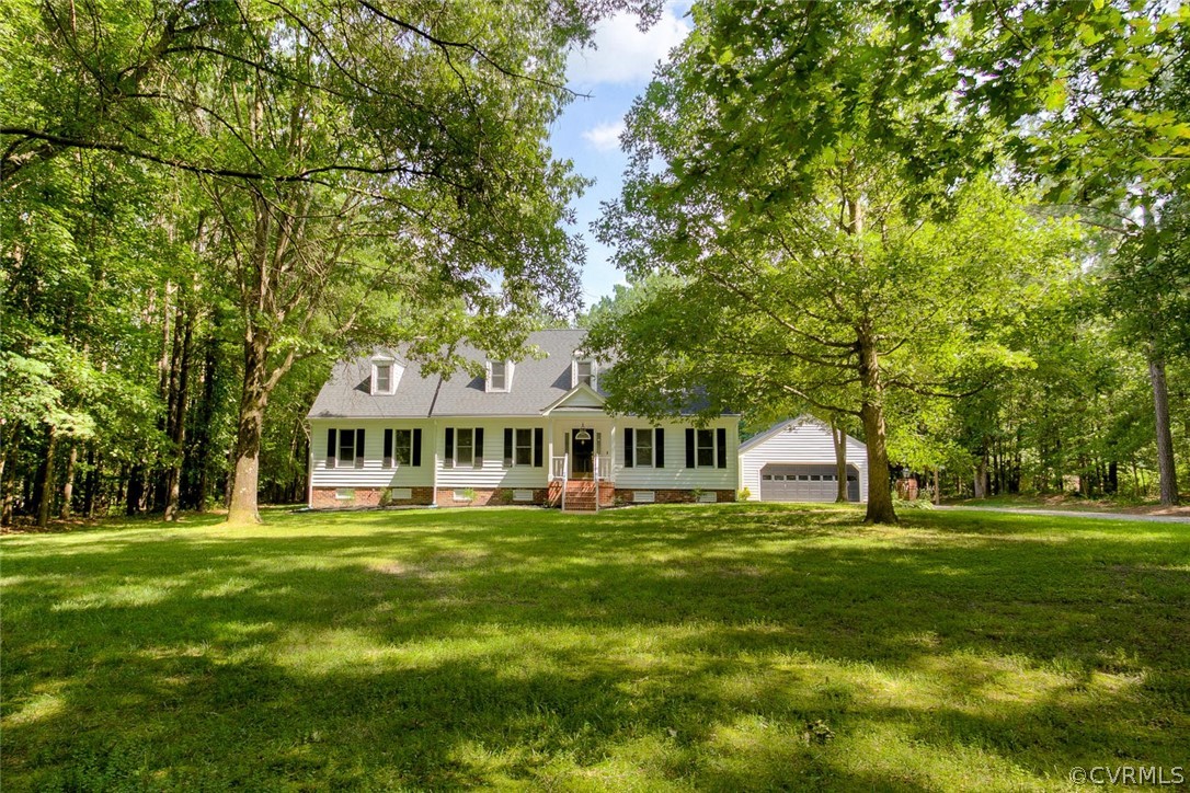 9211 Cattail Road Chesterfield, VA 23838 - Photo 37 of 37 a front view of a house with a garden