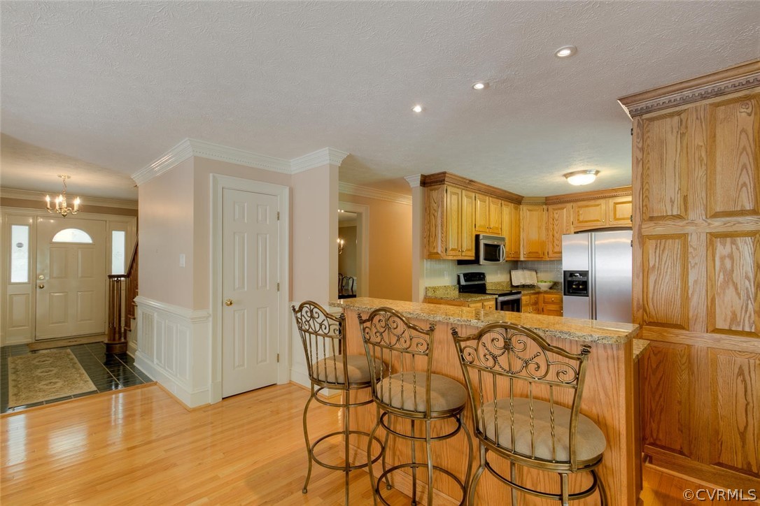 9211 Cattail Road Chesterfield, VA 23838 - Photo 9 of 37 a view of a dining room with furniture