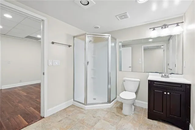 a view of balcony with wooden floor