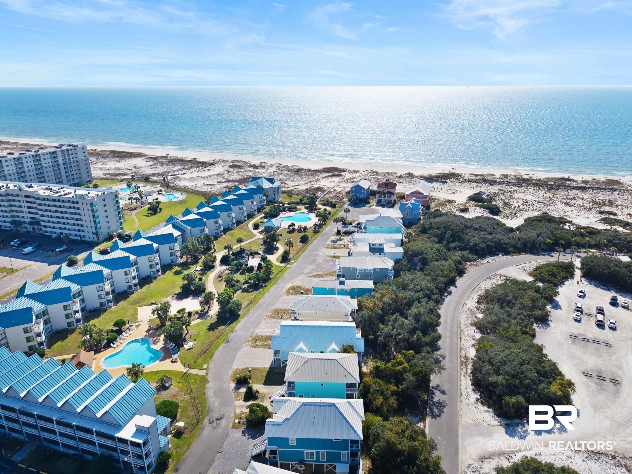 545 Plantation Road, Unit 3 Gulf Shores, AL 36542 - Photo 3 of 54 Bird's eye view of unending shoreline and a pool