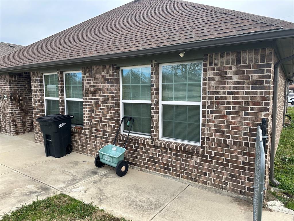 412 South Park Street Terrell, TX 75160 - Photo 14 of 15 a front view of a house with a large window