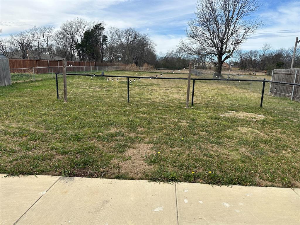 412 South Park Street Terrell, TX 75160 - Photo 15 of 15 a view of three trees with play ground