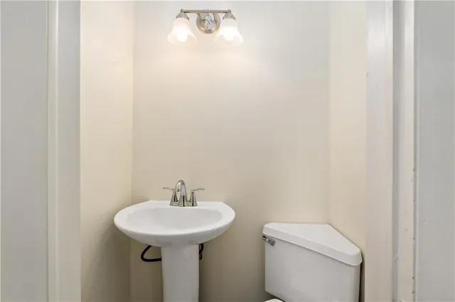 a sink and a toilet in a bathroom