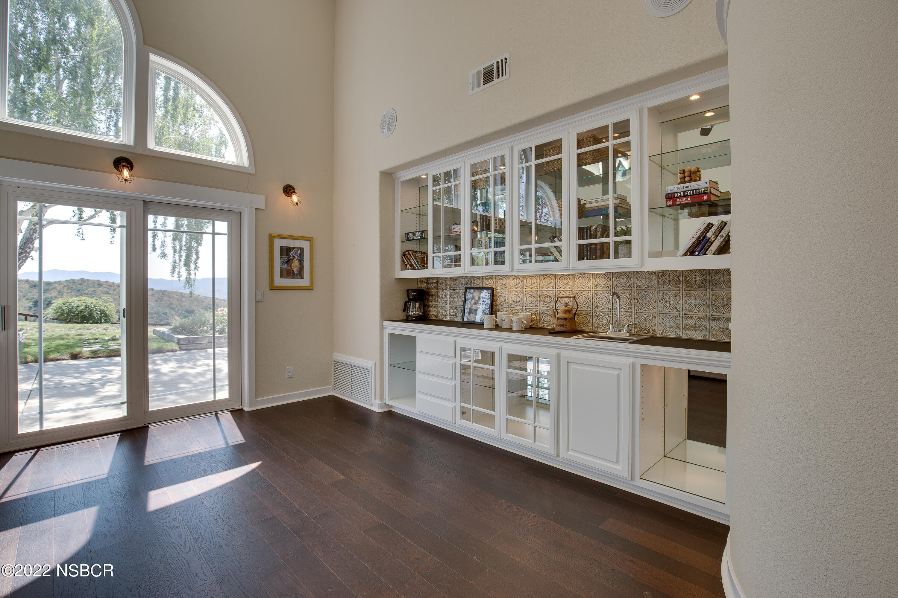 1833 Cougar Ridge Road Buellton, CA 93427 - Photo 17 of 46 a kitchen with stainless steel appliances granite countertop a stove a sink and a large window