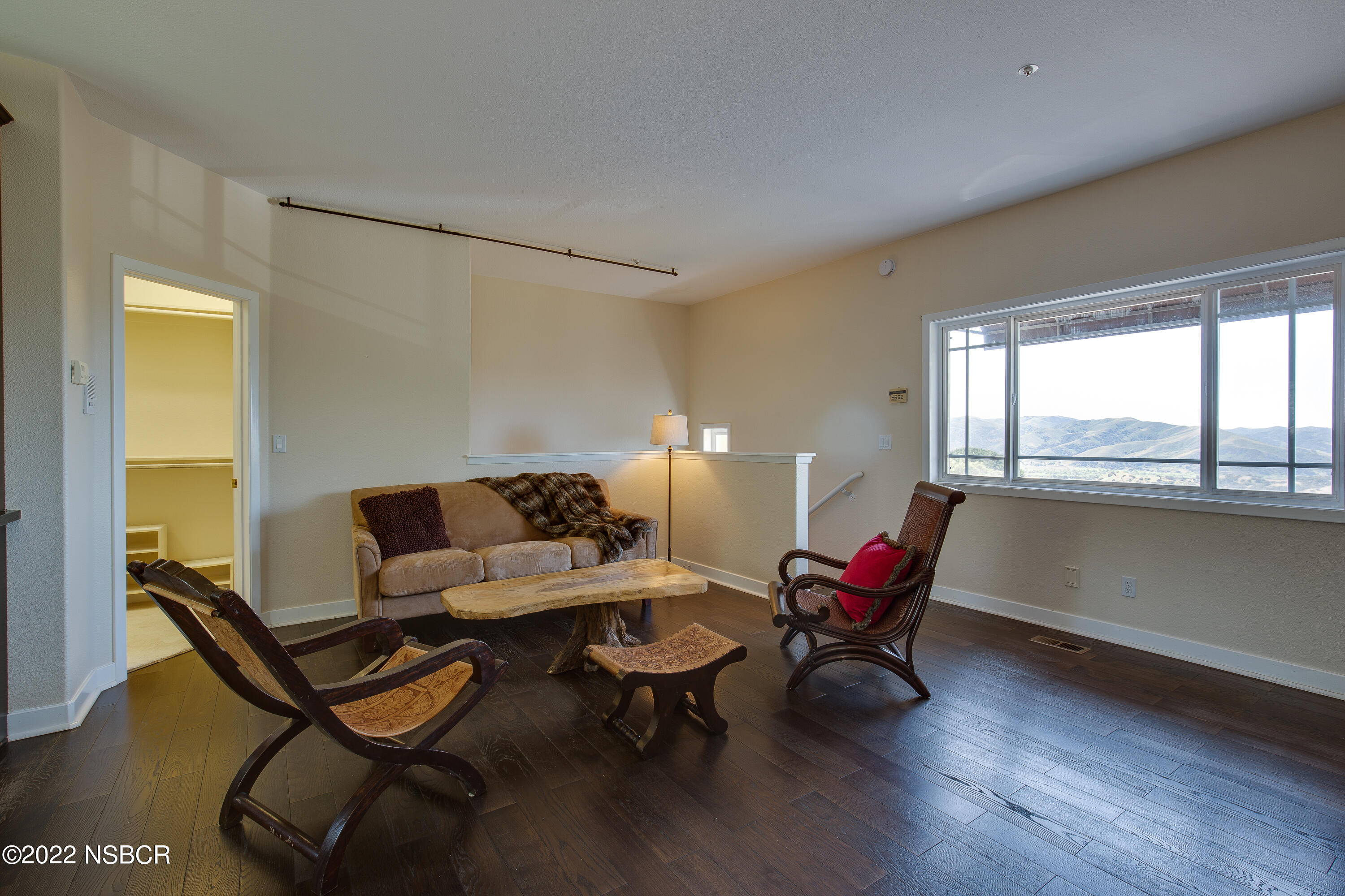 1833 Cougar Ridge Road Buellton, CA 93427 - Photo 24 of 46 a living room with furniture and wooden floor