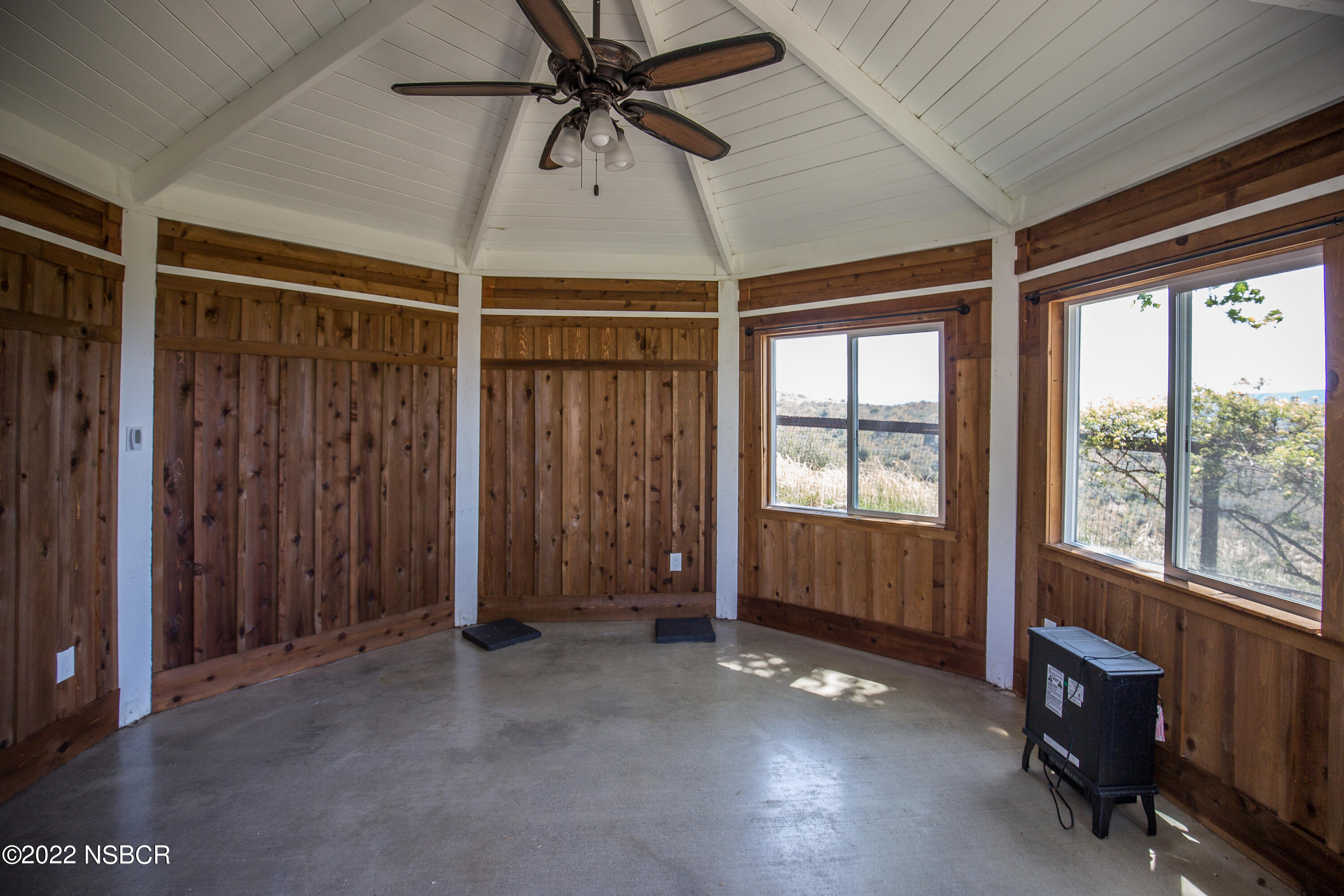 1833 Cougar Ridge Road Buellton, CA 93427 - Photo 37 of 46 a view of a livingroom with a ceiling fan and window