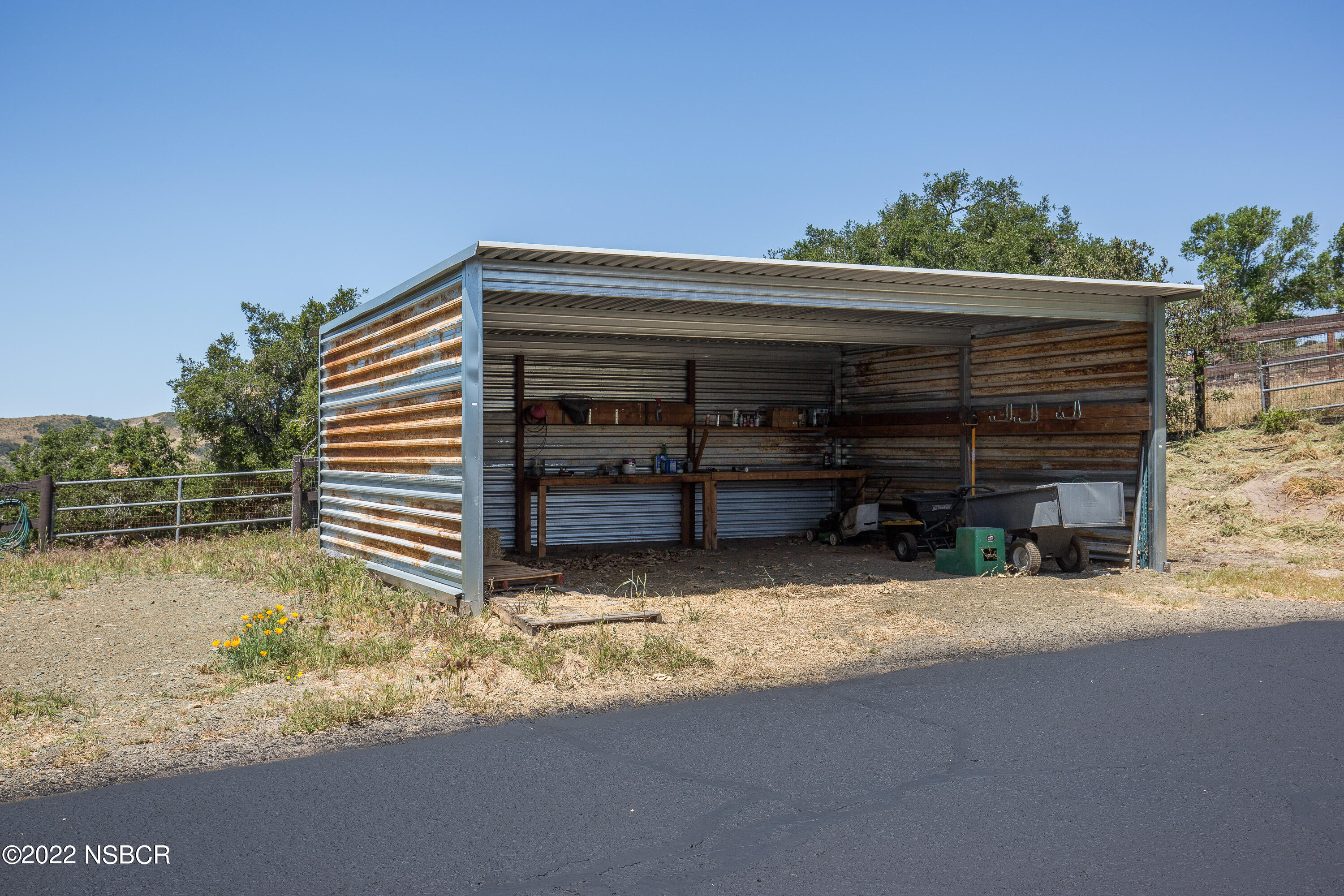 1833 Cougar Ridge Road Buellton, CA 93427 - Photo 42 of 46 a view of a house with a yard