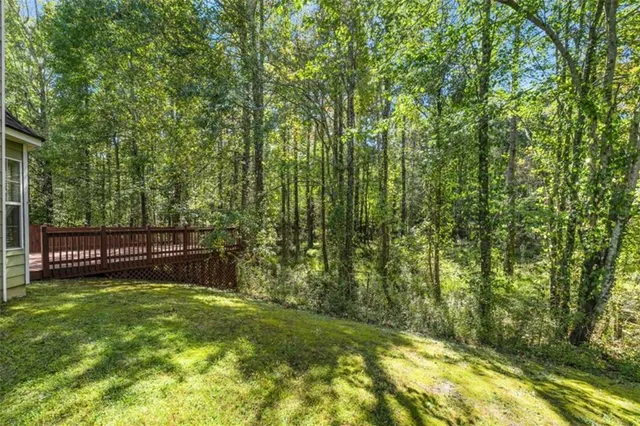 a view of a backyard with a small pool