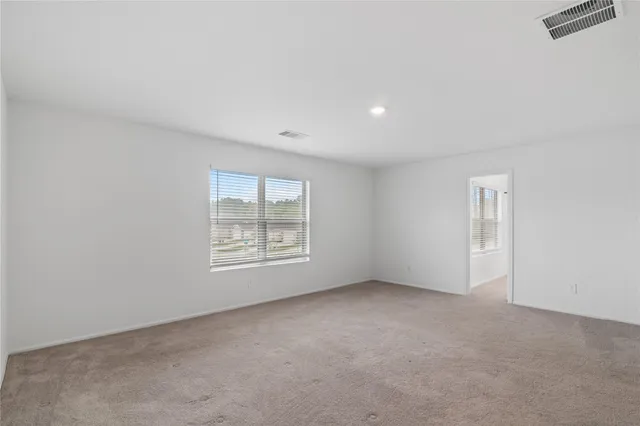 an empty room with windows